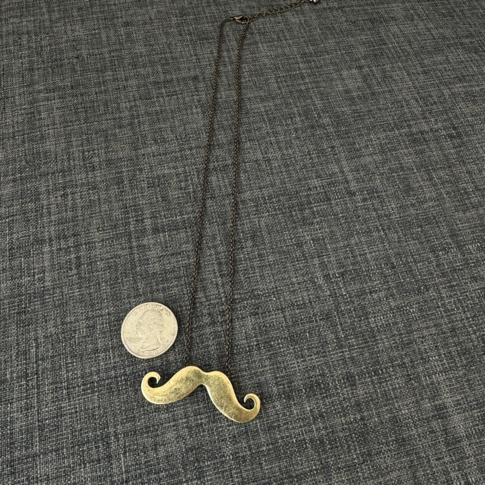 Gold mustache necklace